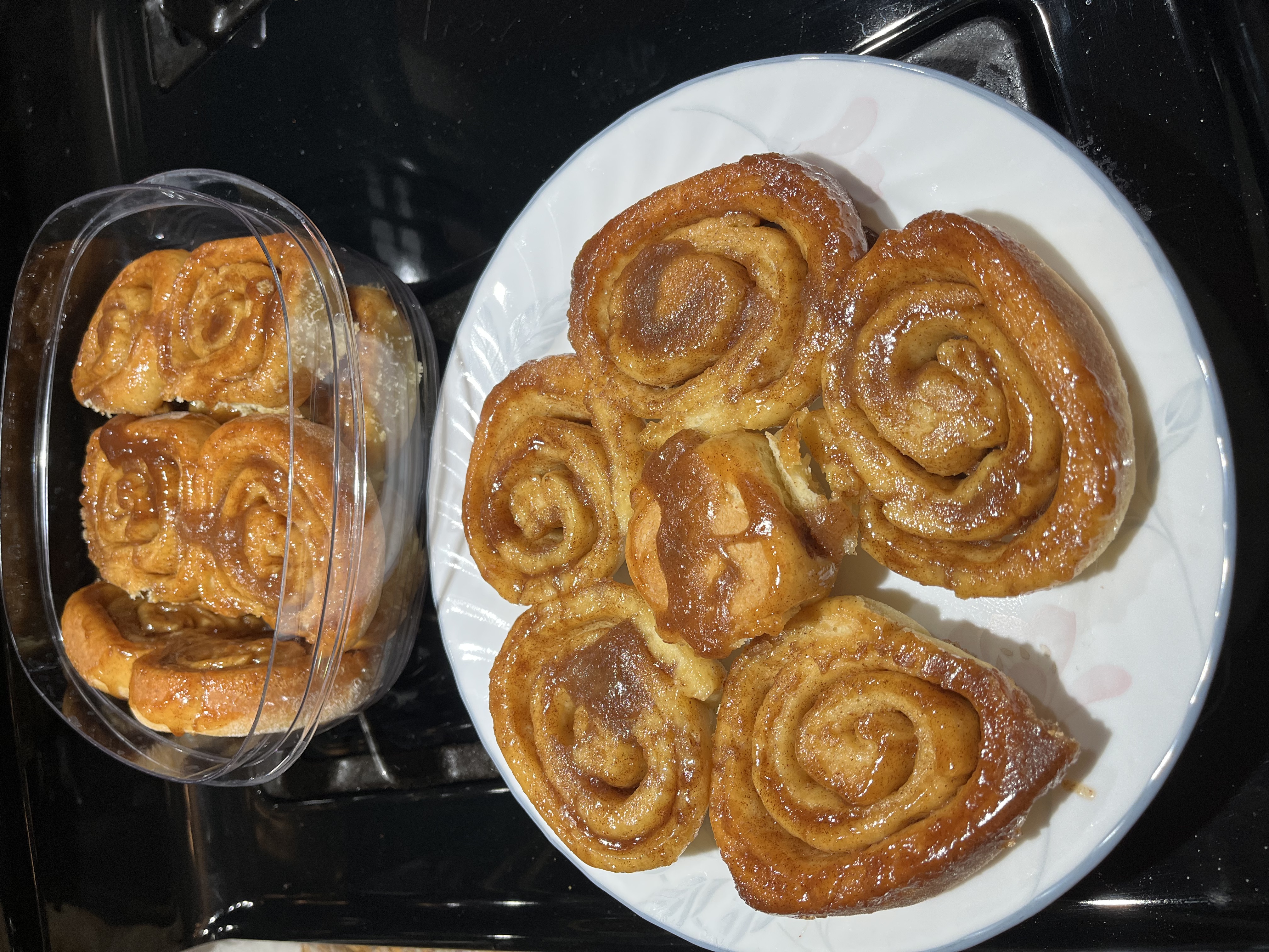 Collection of caramelized golden cinnamon rolls.