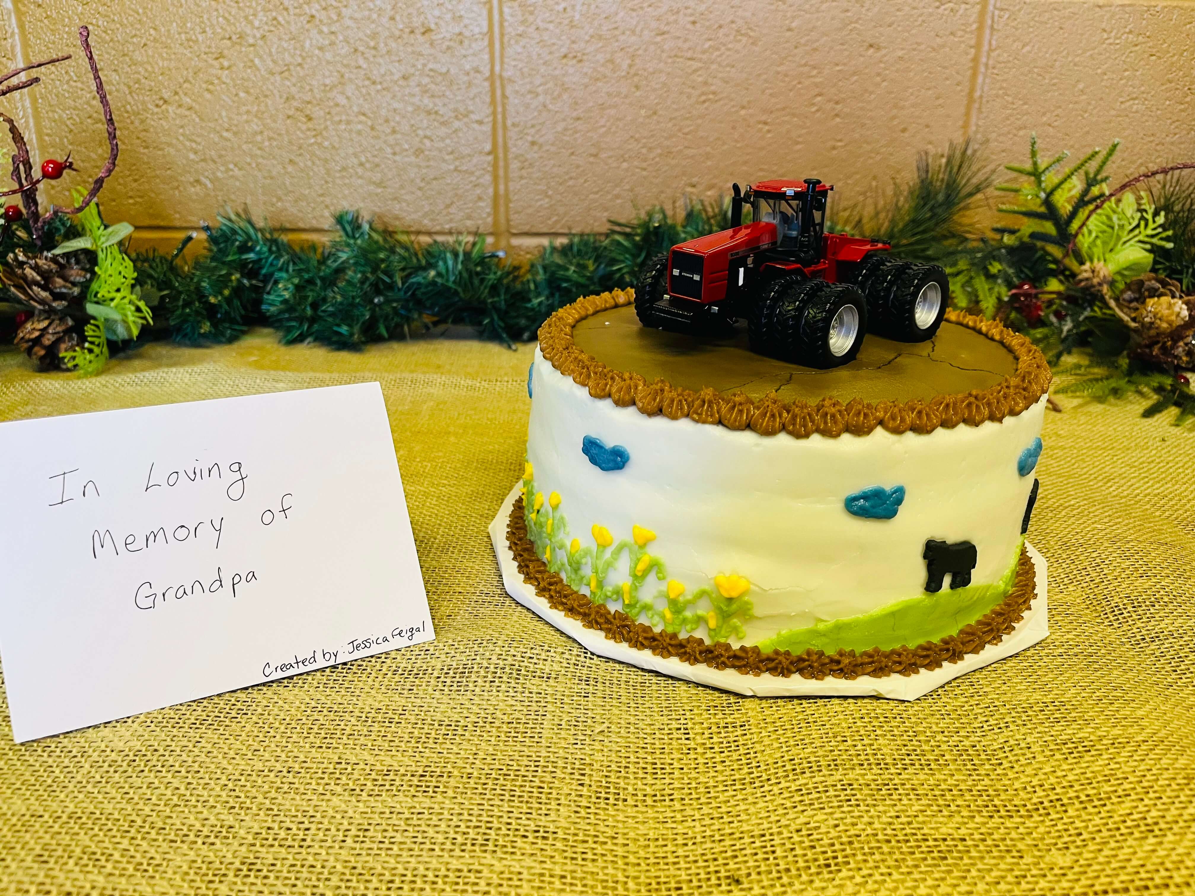 Three-layer 8-inch round yellow cake decorated with three farm scenes.