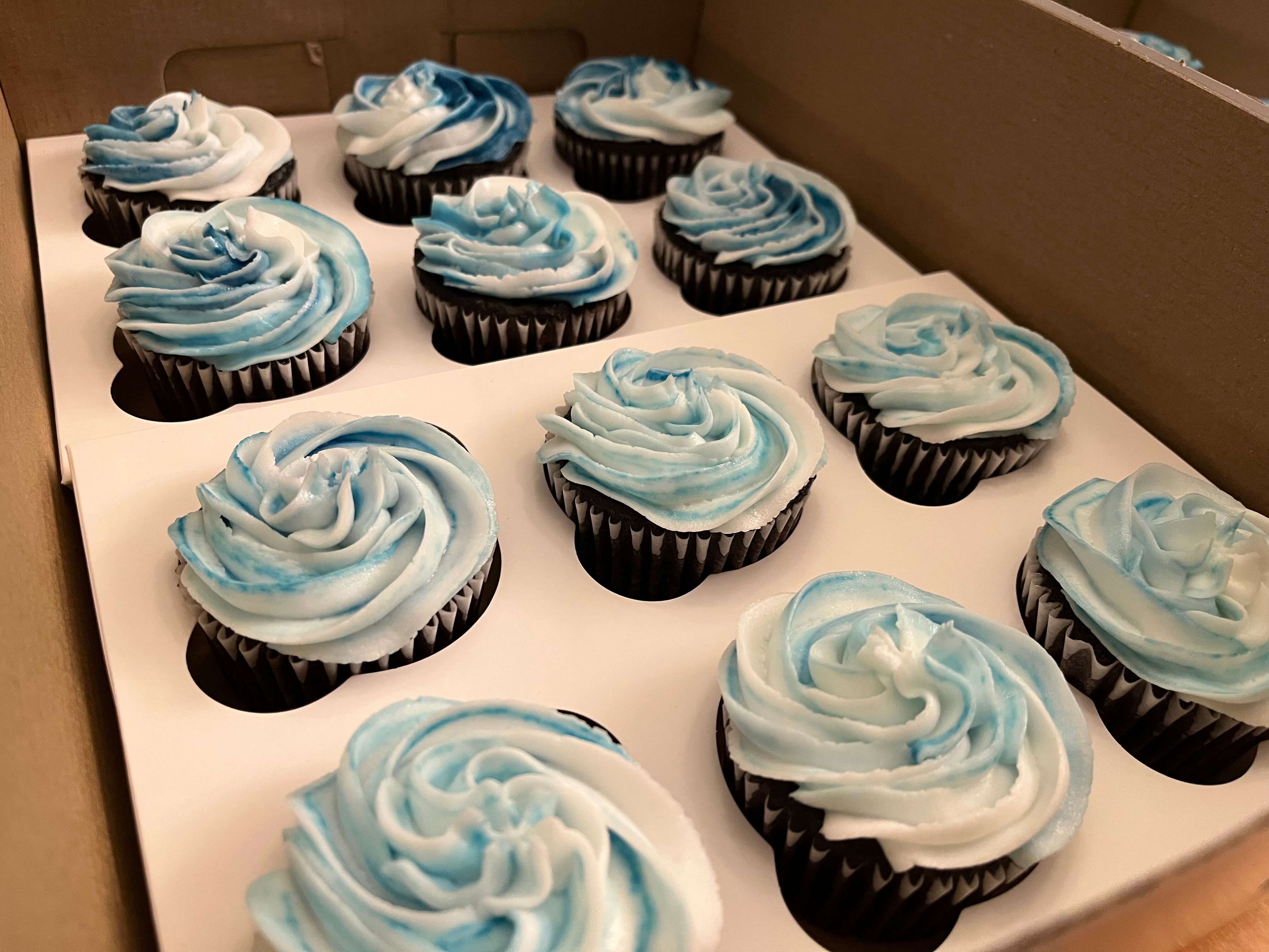 Cupcakes with piped frosting